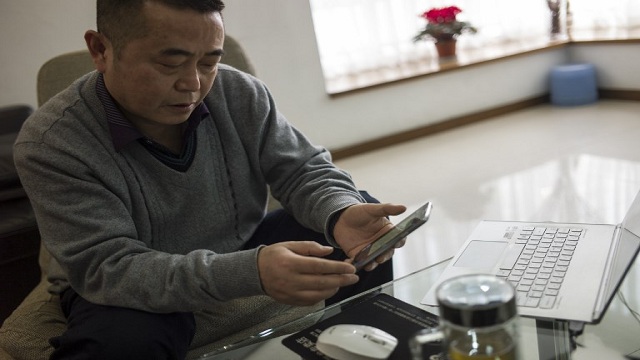 China’s first ‘cyber-dissident’ given 12-year jail